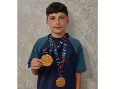 Bir olimpiadada 2 QIZIL medal qazandı